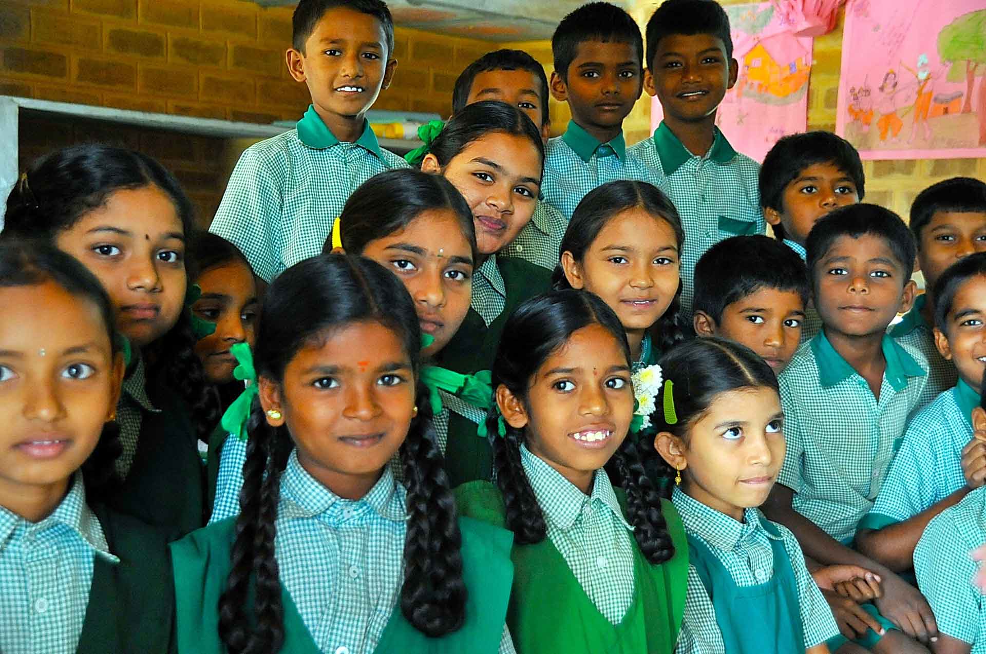 KMR primary students in green uniform